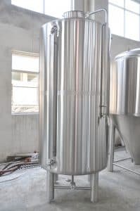 A large metal tank sitting inside of a building