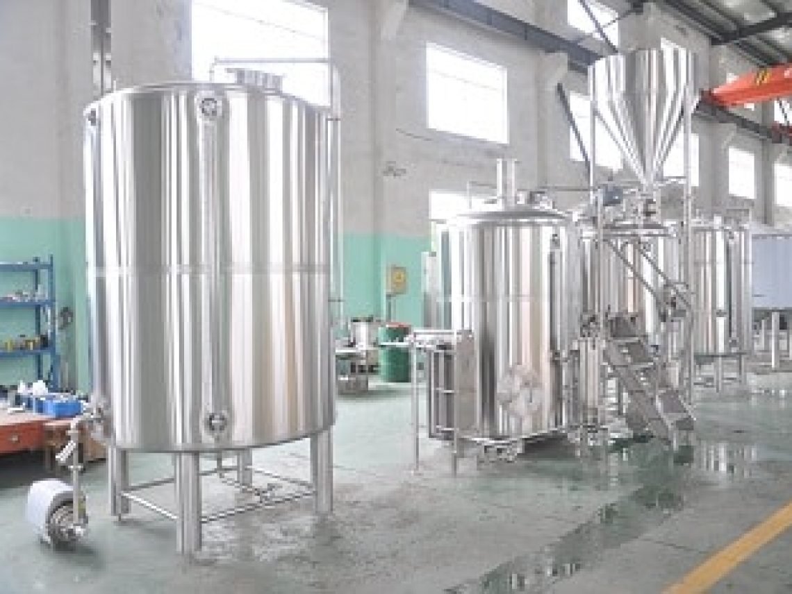 a large room with a bunch of tanks inside of it.