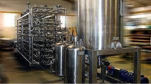 a large metal tank in a large room