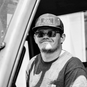 Black and White picture of RedRiver Team Member named "Isaac"