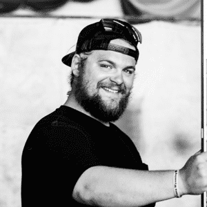 Black and White picture of RedRiver Team Member named "Brandon"