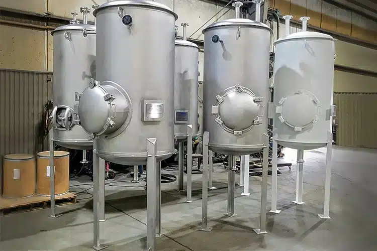 a bunch of tanks that are in a building