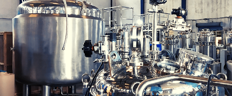 a large metal tank sitting inside of a building