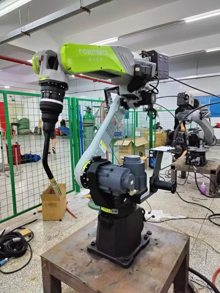 Robotic welding implementation cell in operation at Red River manufacturing facility