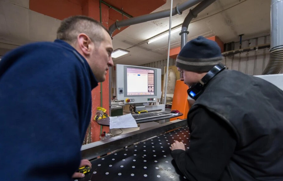 Technician performing digital radiography on a weld joint