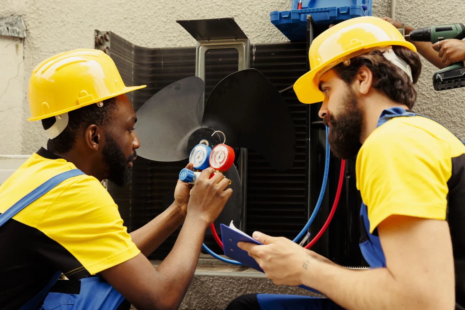 Certified HVAC technician inspecting a refrigerant pressure vessel for EPA Section 608 compliance