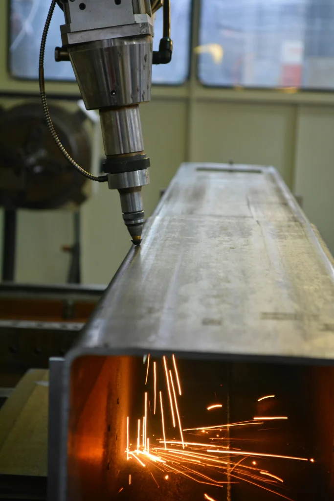 Electron beam welding process on high-strength steel components showing deep penetration weld