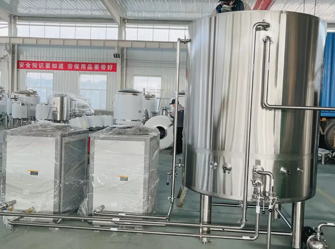 a man standing next to a machine