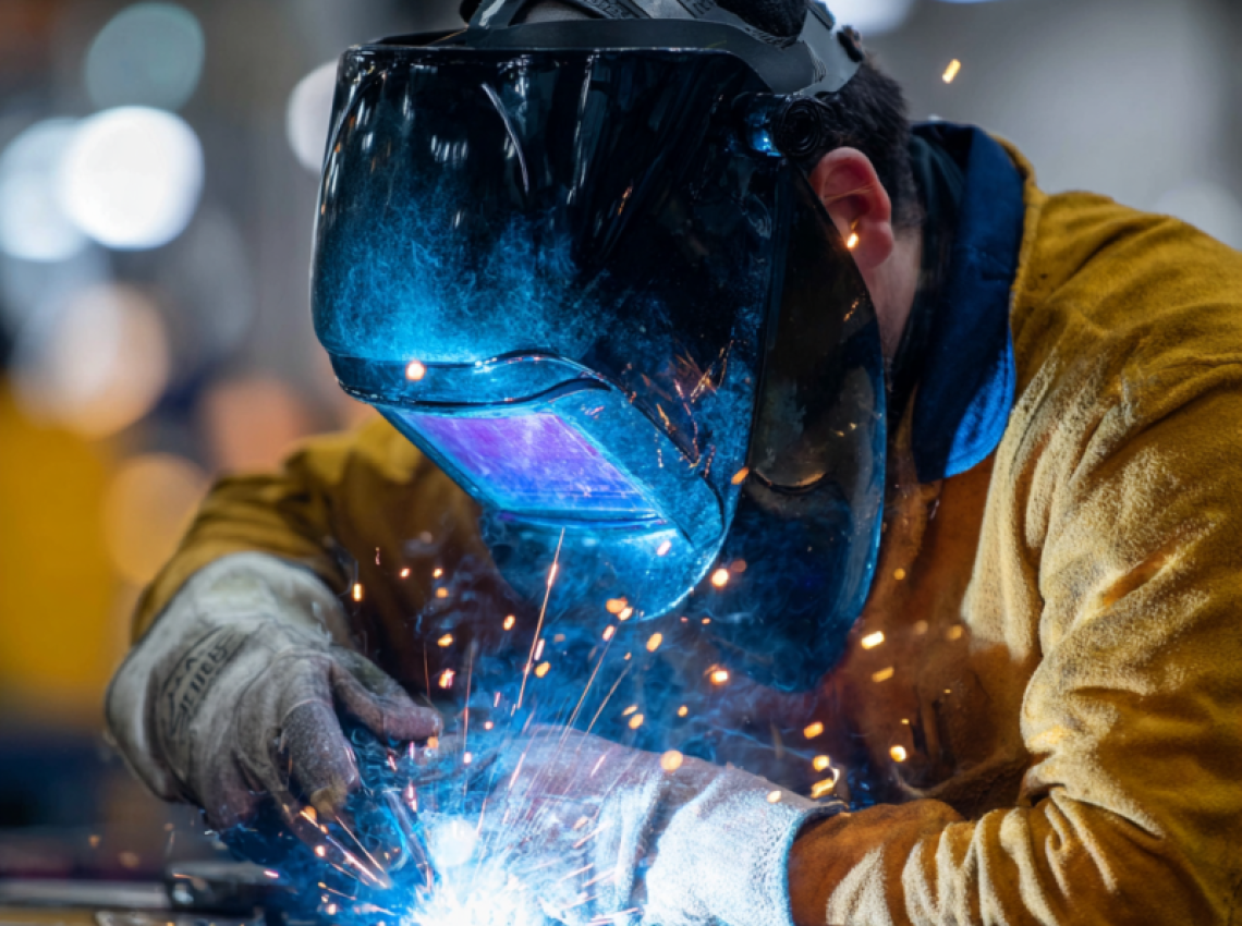 trainee learning what are welding certificate programs in welding lab