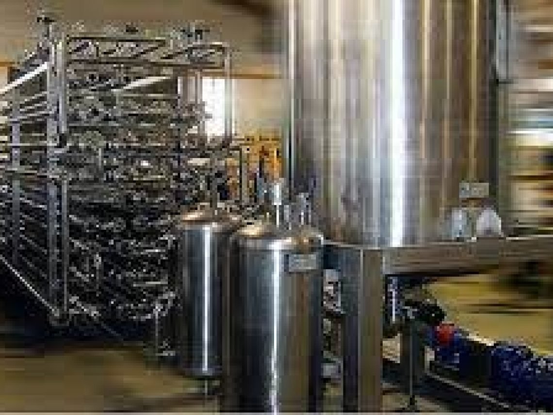 a large metal tank in a large room